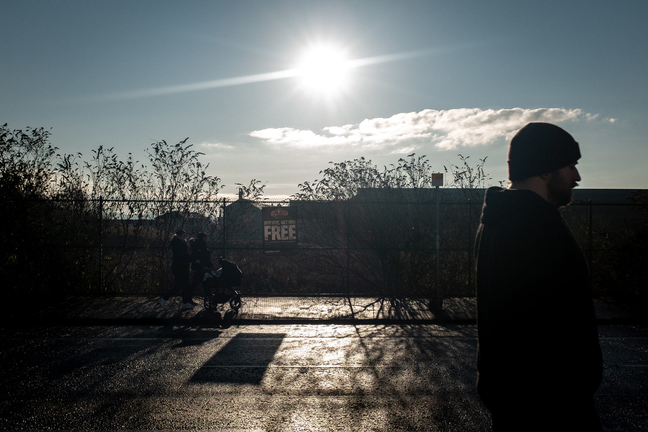 The sun sets on eastern Glasgow, where poverty has reached record levels.