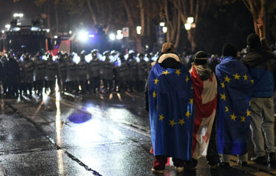 Demonstrators face anti-riot police in Tbilisi. ©Mariam Nikuradze