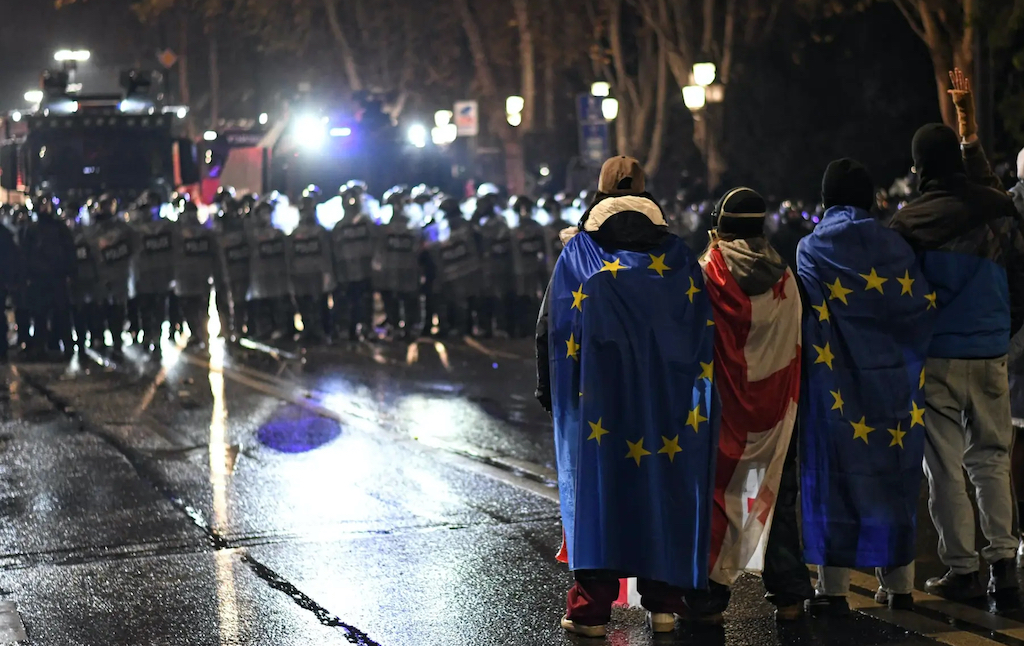 Demonstrators face anti-riot police in Tbilisi. ©Mariam Nikuradze
