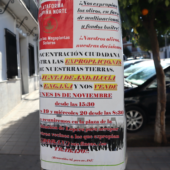 A poster in Lopera calls for a protest against the expropriation of olive grove land. | Photo: ©Bernardo Álvarez-Villar
