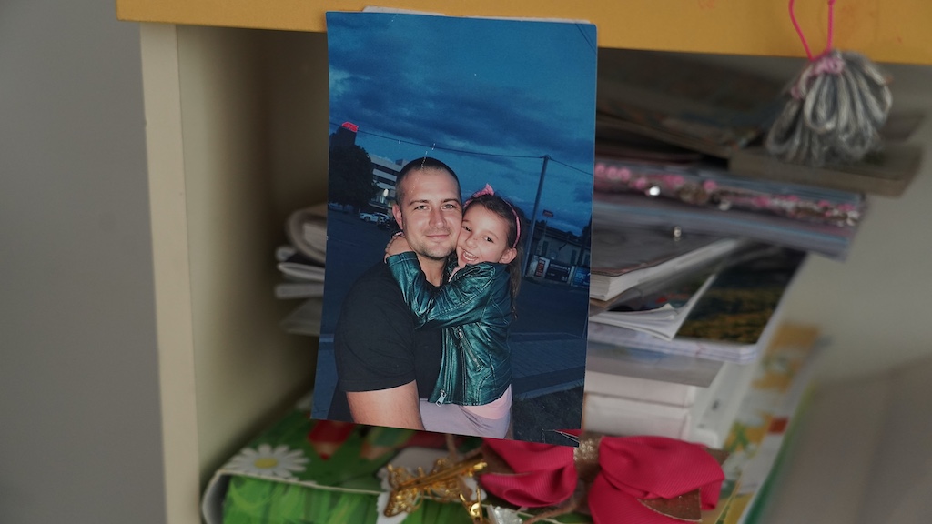Kyiv, 27 January 2026. A photo of Vitaliy Kachuro, who was wounded during the Russian shelling on 9 January, with his daughter Emilia. | Photo: ©Anna Tsyhyma