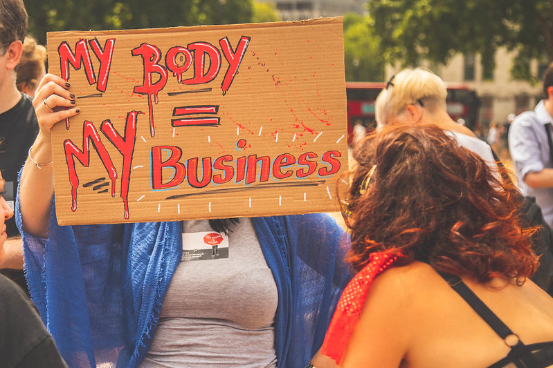 Sex workers demonstrate outside a parlimentary debate in London on the 4 July 2018, to protest discussion of a UK version of FOSTA (A US law that criminalises the advertising of sex work on the internet) and to draw attention to their campaign to fully decriminalise sex work. | Photo: Juno Mac/Flickr CC BY-NC-ND 2.0