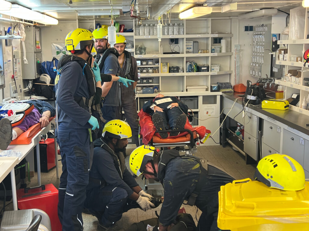 While waiting for the court’s decision, the crew performs a mock rescue exercise. | Photo: Marta Abbà