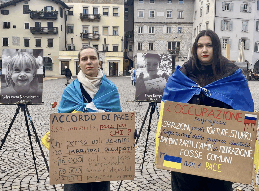 Svitlychna during a an exhibition to commemorate 4 years anniversary of the full-scale war in Trento in Febryary 2026 with a political refugee from Russia. | Photo: Maryna's personal archive